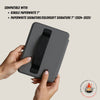 Gray case with black strap held by hands, compatible with Kindle Paperwhite 7" and Paperwhite Signature/Colorsoft Signature 7" devices.