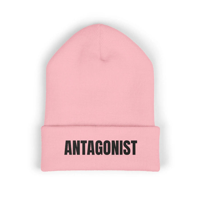 Pink beanie with 'ANTAGONIST' text on a white background
