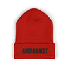 Red beanie with 'ANTAGONIST' text on a white background