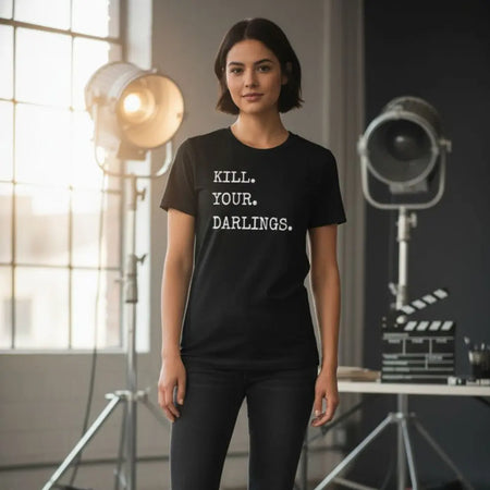 Woman wearing a KILL YOUR DARLINGS slogan black t-shirt with text in a studio setting