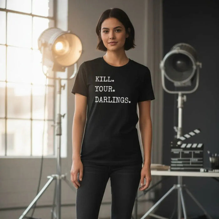 Woman wearing a KILL YOUR DARLINGS slogan black t-shirt with text in a studio setting