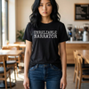 Person wearing a black t-shirt with 'UNRELIABLE NARRATOR' text in a casual setting.